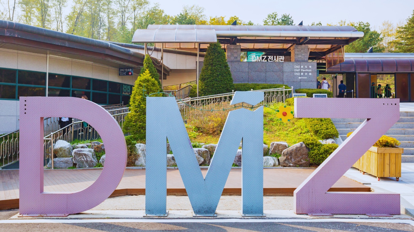 The Demilitarized Zone Tourism In Korea. The DMZ is one of the world's most heavily-guarded military installations. Ironically, it is a popular tourism attraction.